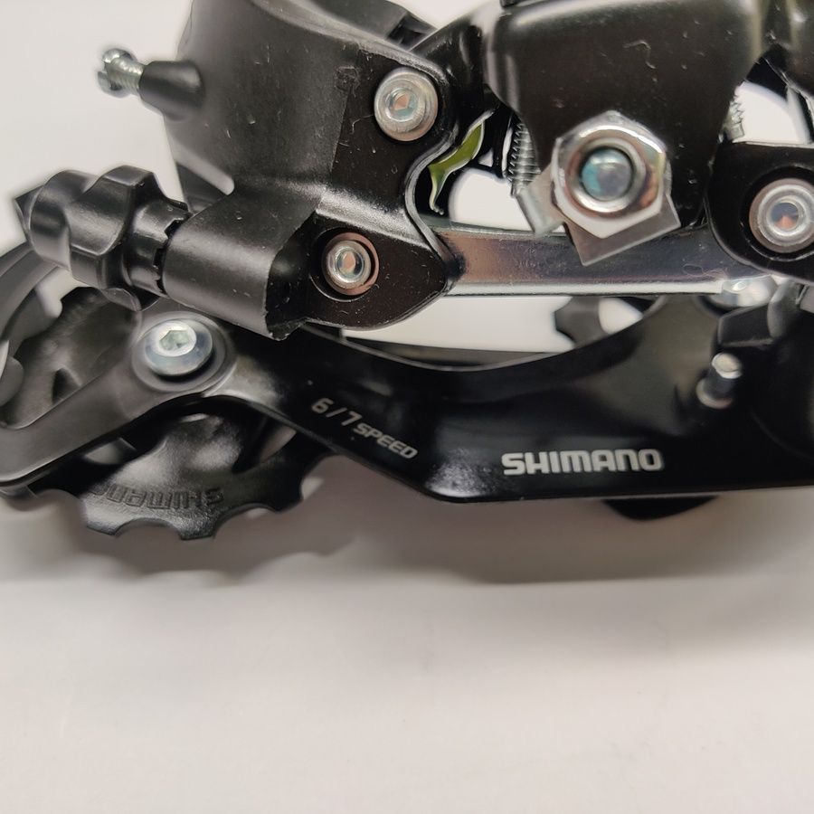 Задній перемикач Shimano Tourney RD-TY300, 6 7, 8 швидкостей (болт)